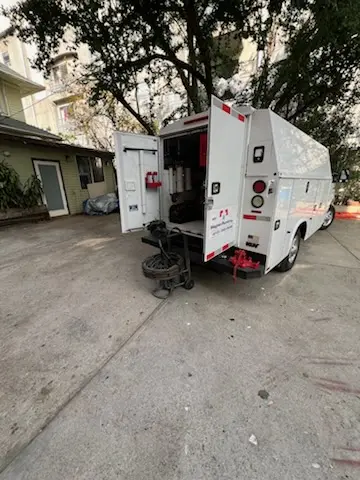 Magnet Plumbing service vehicle on-site for Grease Trap Cleaning in Kendall Park
